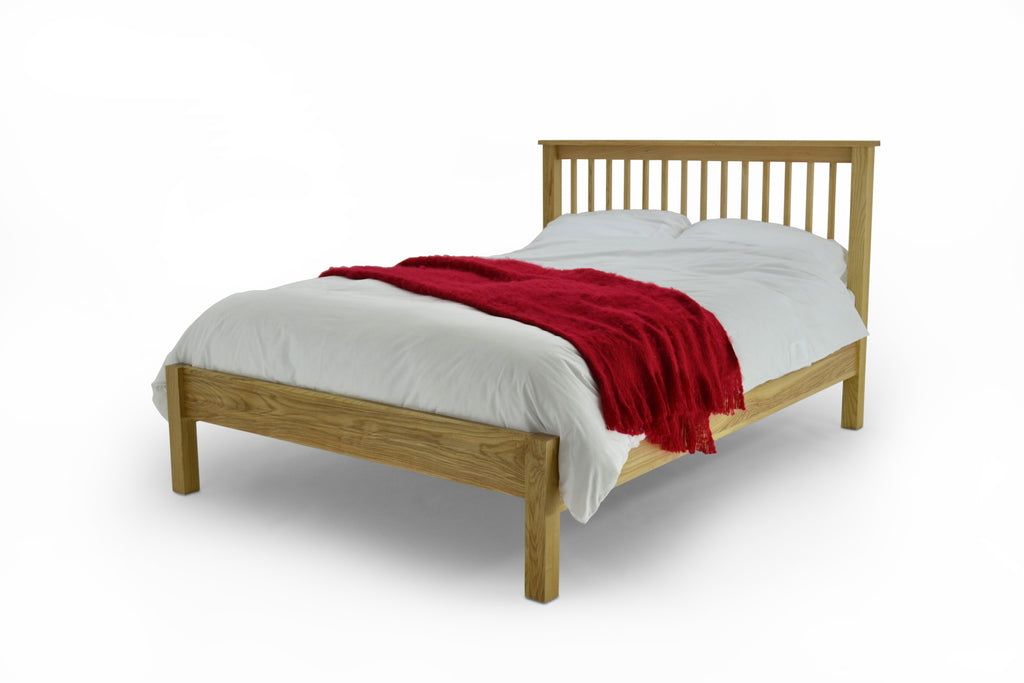 Solid Oak frame in double or king sizes, with 4 cross bars, steel support system and beech sprung slats.