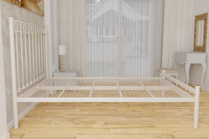 The Twickenham Wrought Iron Bed Frame, pictured here in ivory with a low foot end style.  It has decorative features to the head end and a very strong steel mesh base backed by a 5 year guarantee