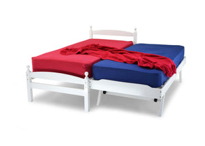 The Koda Guest Bed, is pictured here with the under bed up. It's of hardwood construction including solid slats. The side rails are laminated side rails and have two bolts for extra strength.