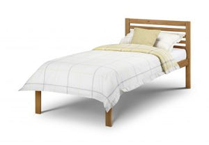 The Ranch Single Bed pictured here in Antique Pine finish, is a modern style wooden frame with a sprung slatted base 