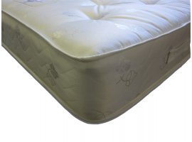 The Buckingham Open Coil mattress features: Medium tension; 12.5g spring unit with steel rod-edge; Generous poly-cotton fillings; Stress-free cloth; Tufted; Reversible