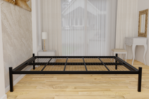 The Feltham Wrought Iron Bed Base is pictured here in black. It is chunky with a very strong welded steel mesh base and comes with fittings for a standard UK sized headboard
