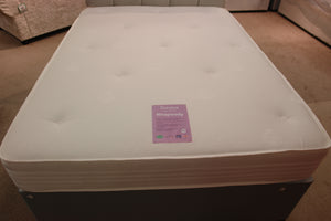 The Rhapsody Mattress, top view with Tufts to maintain shape and support. Features 2" Surelux memory foam. Dual Season underside with no memory foam. Stretch knit fabric top with tufts and Belgian Damask border and underside. 12.5 gauge Bonnell Spring with Rod Edge support.