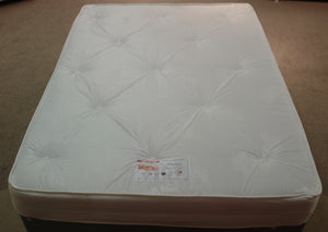 This top view of the Luxury Ortho Spring Mattress shows the white tufted damask fabric over the layers of white orthopaedic filling and hypo-allergenic dust reduction zone. The mattress is turnable, you can use both sides. It’s medium to firm tension, supported by a 13.5 gauge rod edged Bonnell spring unit.
