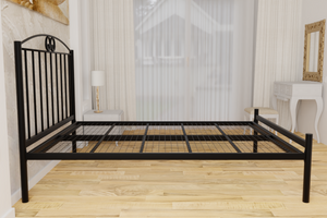 The Holly Wrought Iron Bed Frame, pictured here in black with a low foot end style.  It has decorative features to the head end, together with a very strong steel mesh base backed by a 5 year guarantee