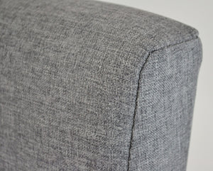 Houston Ottoman Storage Bed Frame, close up of the head end covered in Grey fabric
