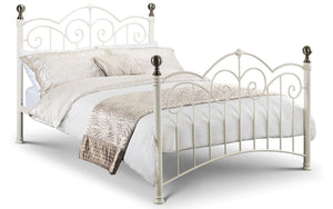 The Isla White Metal Bed Frame is a timeless, classic bed suitable for almost any bedroom design. It is constructed from powder coated steel, with beautiful castings, finished in stone white with brass plated finials.