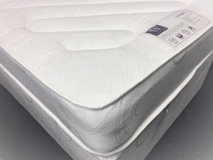 The Langley Divan features: Comfort level - Medium tension; Open coil spring unit with steel rod-edge; Multi-quilted layers of poly-cotton filling; Woven damask cover; Turnable; Matching fabric base