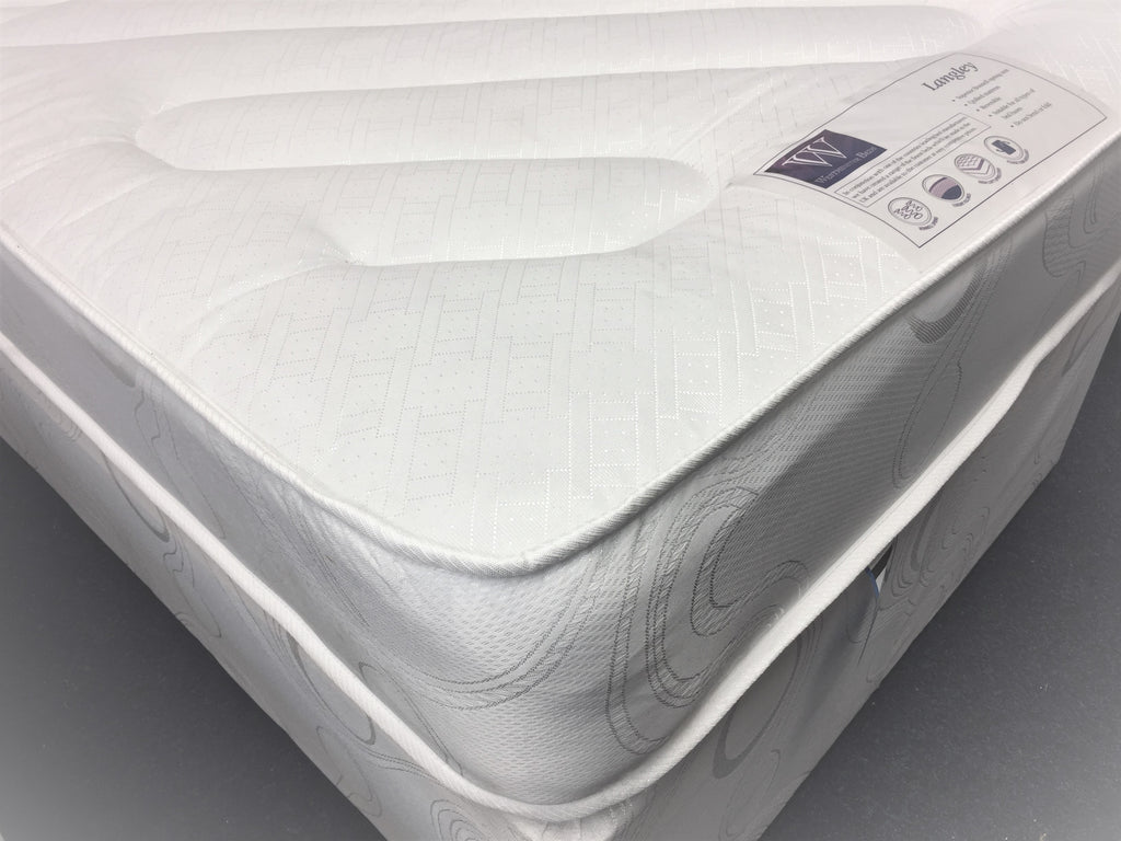 The Langley Mattress features:  Comfort level - Medium tension; Open coil spring unit with steel rod-edge; Multi-quilted layers of poly-cotton filling; Woven damask cover; Turnable