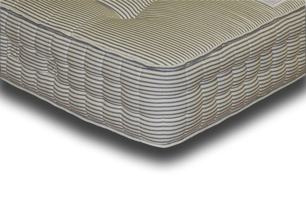 The Pocket Deluxe 2000 mattress features:  2000 Hand nestled pocket springs topped with generous hand-filled and tufted, multi-quilted layers of luxury cotton fillings; Covered in a Contract quality blue and white stripe Source 5 cotton fabric
