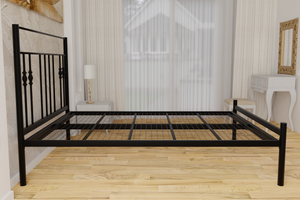 The Yiewsley Wrought Iron Bed Frame, pictured here in black with a low foot end style.  It has decorative features to the head end and a very strong steel mesh base backed by a 5 year guarantee